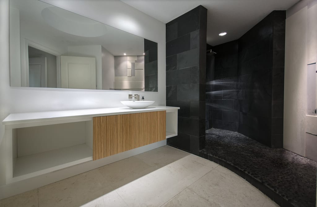 Contemporary Bath with concrete Wall tile shower