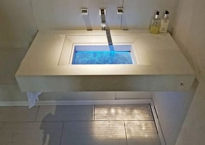 Custom Concrete and Glass Floating Bathroom Sink in Tampa Florida Downing Designs  Tampa Florida LED Lights Modern Bath showroom