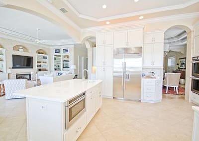 White Glass Countertops in Shaker style kitchen...beautiful in St petersburg Florida island top