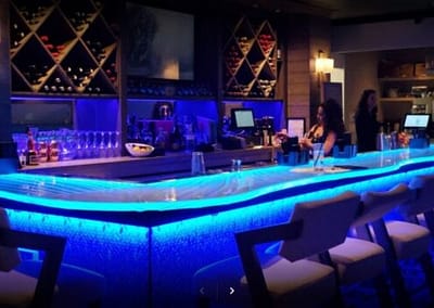 Glass bar countertop in West Palm Beach Acqua Cafe Restaurant with LED