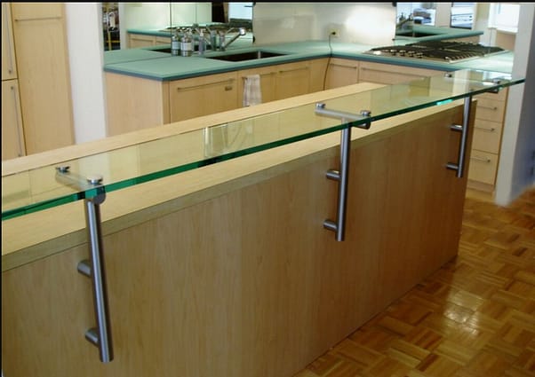 Glass Countertop with Hockey Pucks and Archaic supports